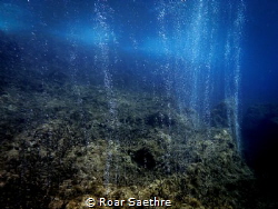 Bubble Blues.
Volcanic bubbles underwater, camera: Lumix... by Roar Saethre 